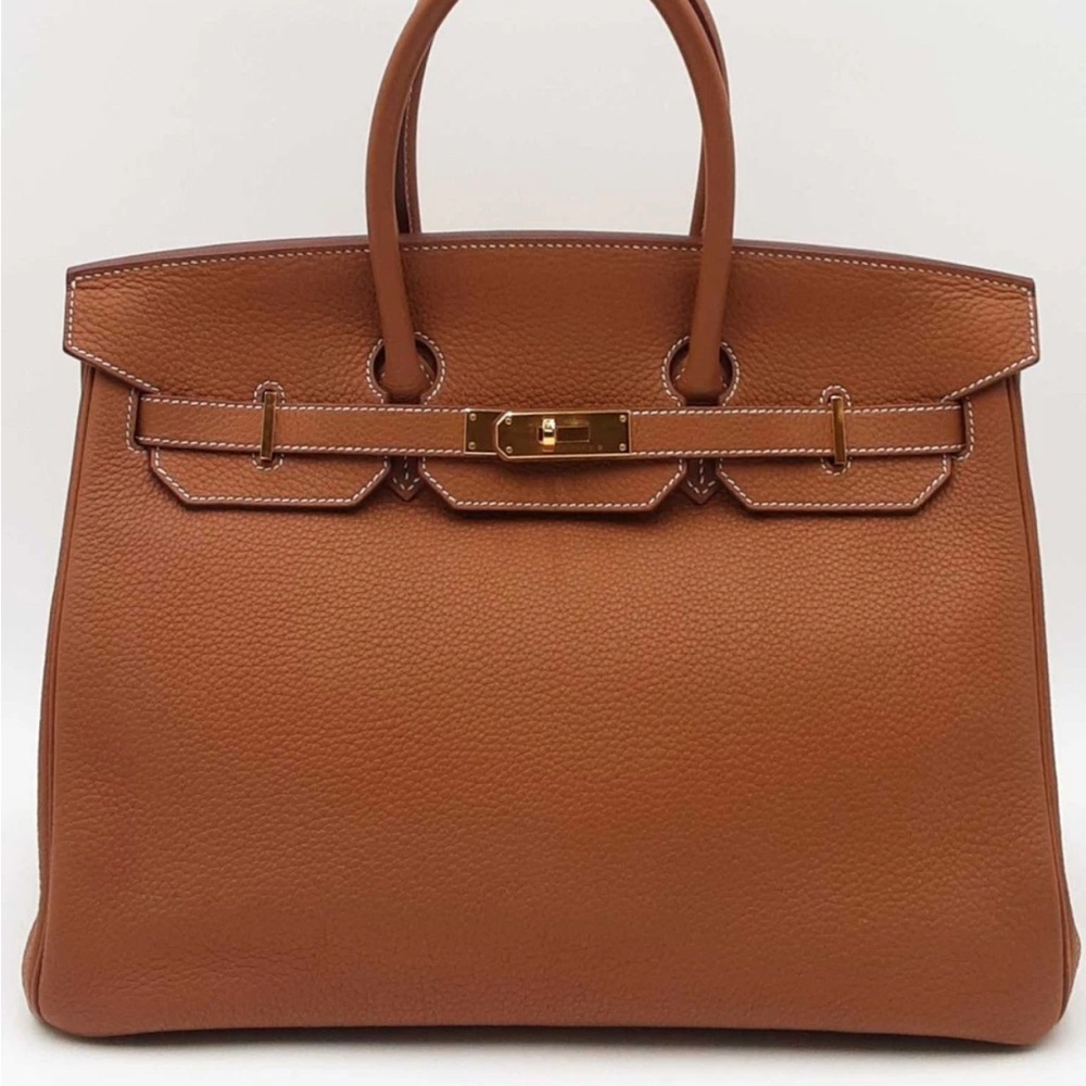 Leather women’s purse at brand new condition with handles , hand stitches